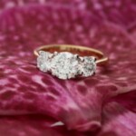 Gold engagement ring with 3 large diamonds